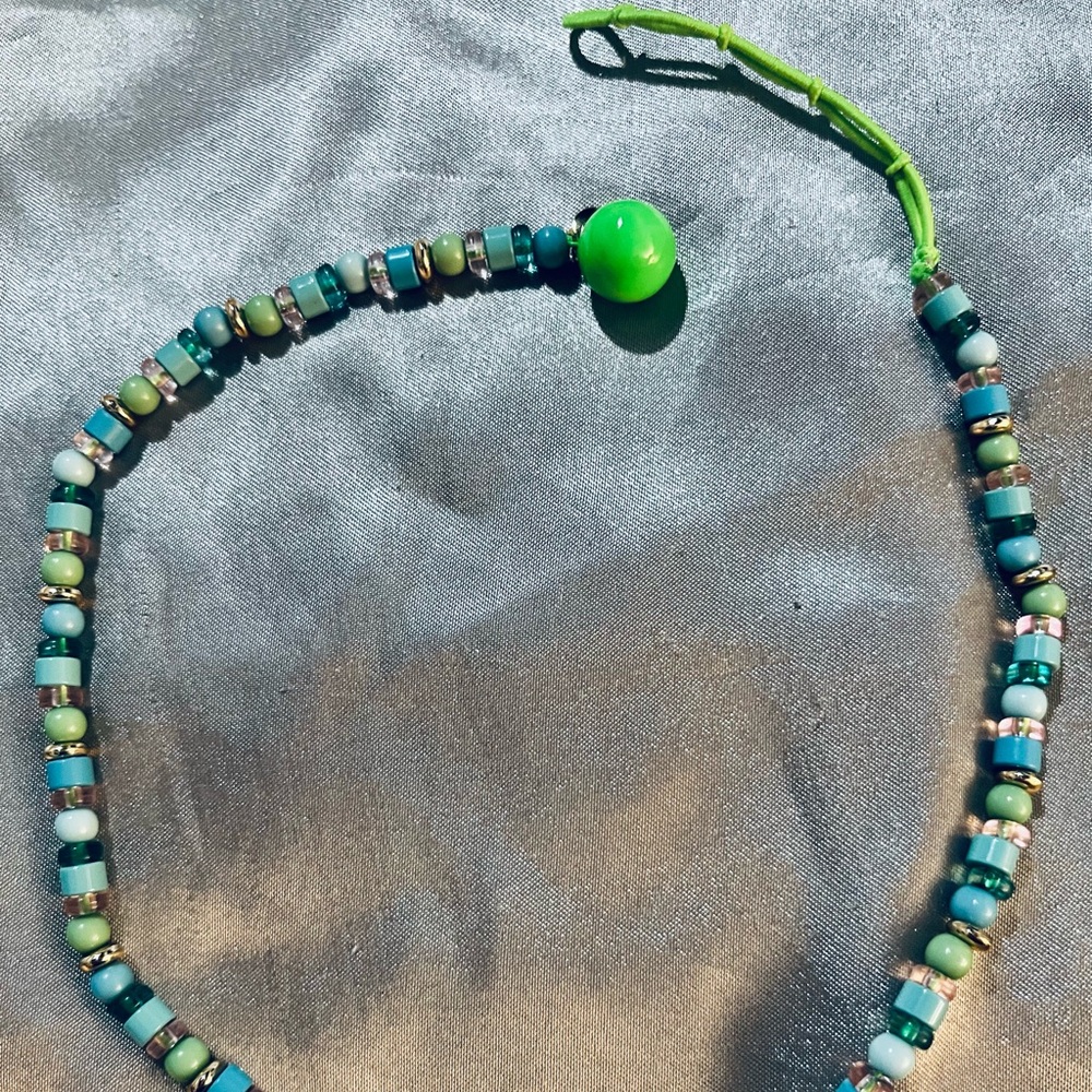 Bubble bar green and blue crystal necklace with a toggle clasp